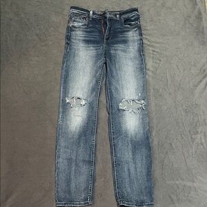 Women’s Distressed Blue Jeans